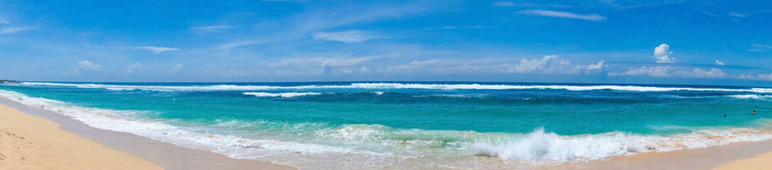 Melasti Beach is beautiful with white sand and blue sea water