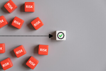 Close up shot with red cube with risk identify risk and solve with certified standard. Risk...