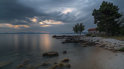 Serene Seascape: Coastal House at Sunset