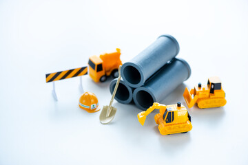 Fototapeta premium 重機と工事現場 劣化した水道管の更新イメージ