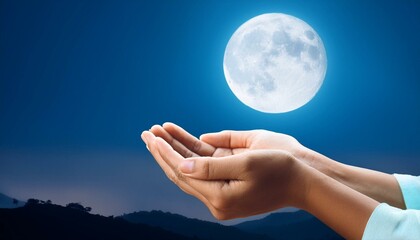 Hand of muslim people praying with full moon background. Ramadan kareem