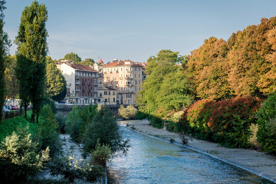 Turin, Italy. Autumn landscape along the banks of the Dora river, the second river of the city.