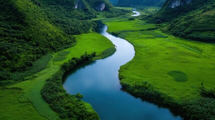 Fototapeta premium A river with a green valley in the background