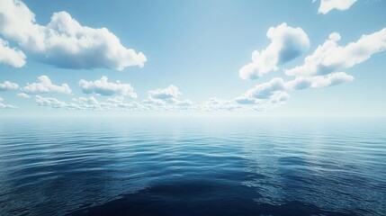 Obraz premium A vast expanse of blue ocean with white clouds in the sky, creating an endless horizon. 