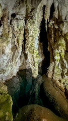 Mysterious limestone cave with stalactites and stalagmites, exploring the wonders of geology and underground adventure tourism  stopica pecina