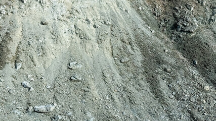 A barren, rocky hillside illustrates soil erosion and environmental degradation, highlighting the importance of Earth Day awareness