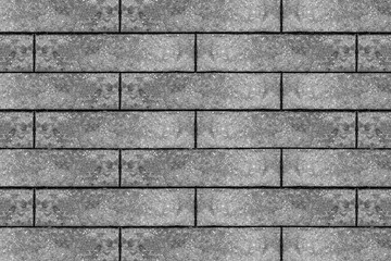 Grey straight block paving stones closeup background