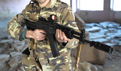 Mercenary in a demolished building, ready to attack