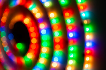 Abstract colorful lights in spiral circle, abstract holiday background