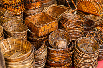 woven wooden baskets in a store for sale in the city of la paz, bolivia - handicraft concept