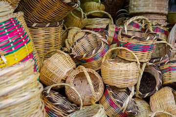 colorful woven baskets for sale in the city of la paz, bolivia - handicraft concept