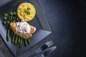 Green asparagus with grilled chicken fillet and couscous