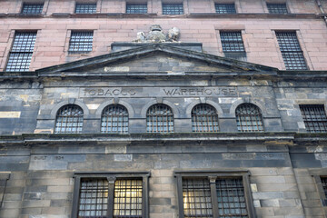 Obraz premium Facade and Pediment on Front of Old 19th Century Stone Warehouse 