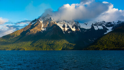 sailing through the mountainous region of the national park Alacalufes, Chile