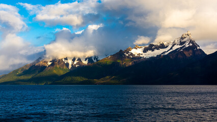 sailing through the mountainous region of the national park Alacalufes, Chile