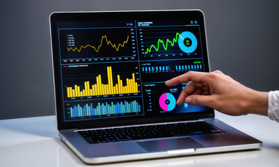 Financial analytics dashboard with data visualization on laptop screen. Business intelligence interface with performance charts, kpi metrics, and interactive graphs. Professional technology display
