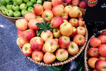 Fresh red apples in wooden basket ,sweet fruit.