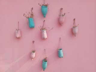 Round chandeliers hanging above a beautiful background wall