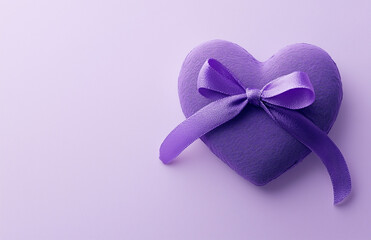 Violet-themed photo of a heart with a ribbon.Minimal creative Valrntine's holiday concept.Copy space,flat lay 