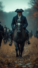 Fototapeta premium Man horseback riding, autumn forest, historical attire, group ride. Stock photo.