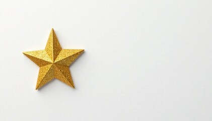 Glittering gold star on white background isolated against plain, background, paper cut