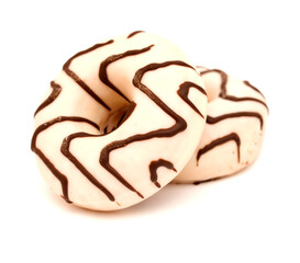 White chocolate glazed ring doughnut with zebra pattern isolated on White background 