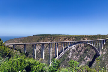 The Bloukrans Bridge is a single-span concrete road bridge in South Africa. It crosses the Bloukrans River, which divides the Eastern Cape (Kakadu district) and Western Cape (Eden district) provinces.