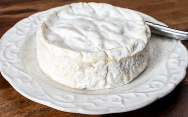 French soft Camembert cheese, original Camembert de Normandie made from raw unpasteurised cow milk