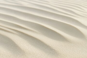 Obraz premium Serene coastal landscape featuring smooth, soft sand with gentle ripples creating tranquility