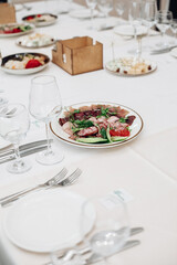 restaurant table setting, banquet, dishes are on the table