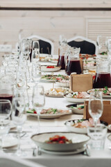 restaurant table setting, banquet, dishes are on the table