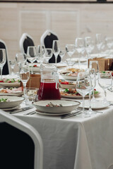 restaurant table setting, banquet, dishes are on the table