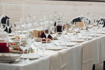 restaurant table setting, banquet, dishes are on the table