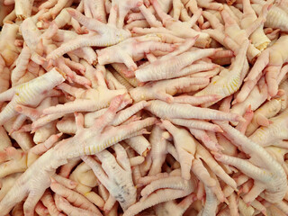 Raw Chicken feet. Background Image From Market.