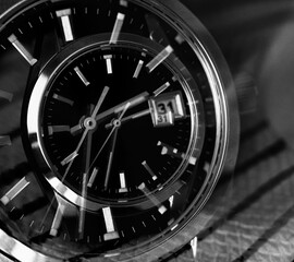 mechanical watch lies on a dark background