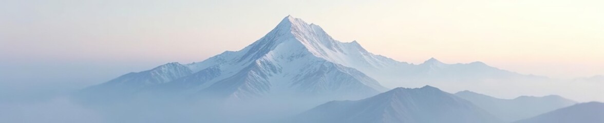 Obraz premium Soft gray haze envelops the snow-covered mountain peak in the morning light, atmospheric, haze, light