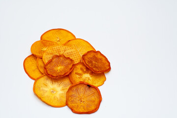 Slices, snacks, dried persimmon chips. Fruit snacks, healthy snack, vegetarian food, selective focus, close-up