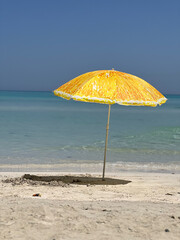 beach and umbrella