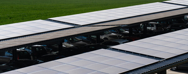 Solar canopy. Parking space with solar panels on a roof