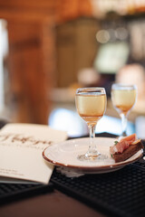 Beautiful elegant woman in black dress with festive makeup, beautiful photo with bokeh background