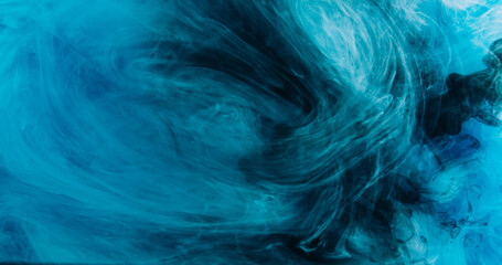 Paint mist. Smoke texture. Defocused blue color fog splash wave floating underwater flow on dark black abstract art background.