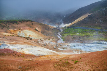 Colorful soil due to active fumaroles in Krysuvik-Seltun Geothermal Hot Springs area in Iceland.