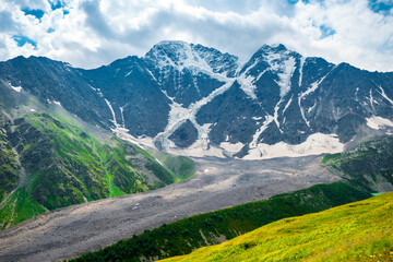 Picturesque mountain landscape with a view of the glacier 