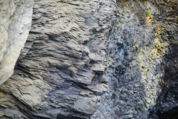 Basalt rock formations on Reynisfjara Black Sand beach near Vik in Iceland