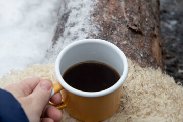 cup of coffee in the snow