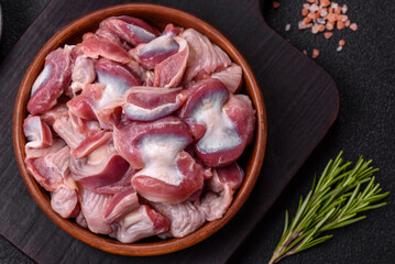 Raw chicken or turkey gizzards with salt, spices and herbs