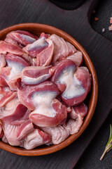 Raw chicken or turkey gizzards with salt, spices and herbs