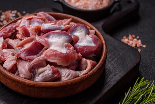 Raw chicken or turkey gizzards with salt, spices and herbs