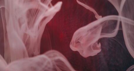 Flowing water. Smoke texture. Defocused white red colorful shine liquid drops flow fluid vapor wave...