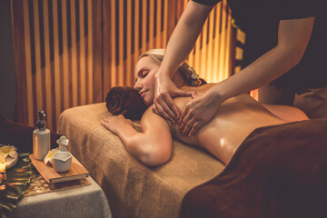 Caucasian woman customer enjoying relaxing anti-stress spa massage and pampering with beauty skin...